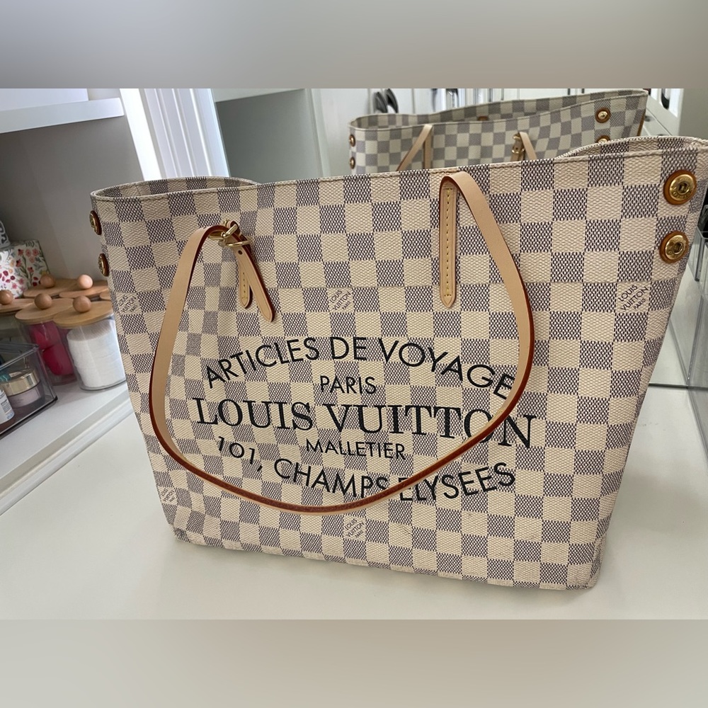 Authentic Limited edition Louis Vuitton tote in brand new condition.